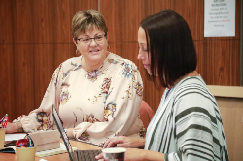 Positive Partnerships workshop working at a table