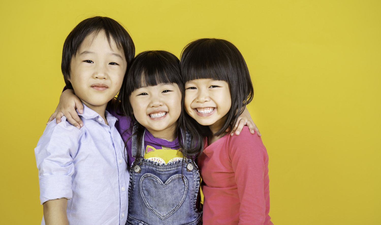 Young Chinese Boy 2 Girls Smiling And Hugging